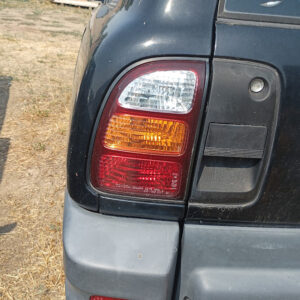 1998-2000 Toyota RAV4 Driver (LH) Tail Light Quarter Panel Mounted OEM