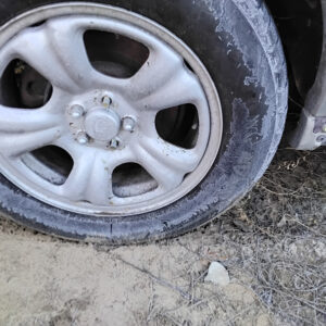 Silver OEM Subaru Forester factory alloy wheel with 5-spoke design and center cap
