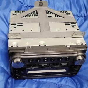 2006-2008 Suzuki Grand Vitara OEM Clarion CD radio stereo player with mounting bracket