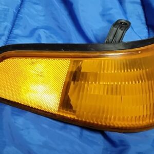 Used Right Passenger Side Front Corner Turn Signal Light for 1991-1996 Ford Escort