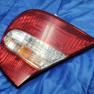 OEM 2002-2004 Toyota Camry passenger side right outer tail light assembly front lens view