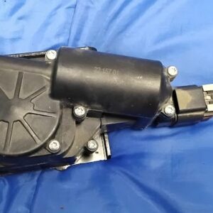 OEM 2007-2012 GMC Acadia power liftgate latch actuator motor housing top view showing stamp numbers