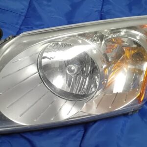 OEM Dodge Caliber passenger side right headlight assembly front view
