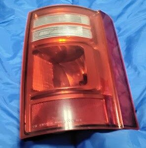 OEM 2008-2020 Dodge Grand Caravan passenger side right tail light assembly front lens view