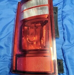 OEM 2008-2020 Dodge Grand Caravan driver side left tail light assembly front lens view