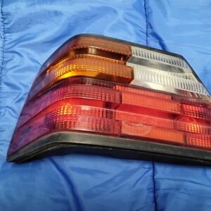OEM Mercedes-Benz W124 driver side left tail light lens assembly front view