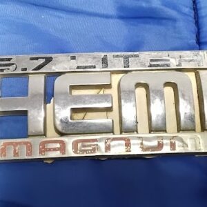 Front view of OEM Dodge Ram 5.7 Liter Hemi Magnum chrome fender badge emblem