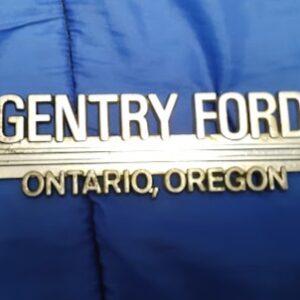 Front view of vintage Gentry Ford Ontario Oregon metal dealership trunk badge emblem